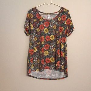 NWOT. Lularoe floral short-sleeved shirt.